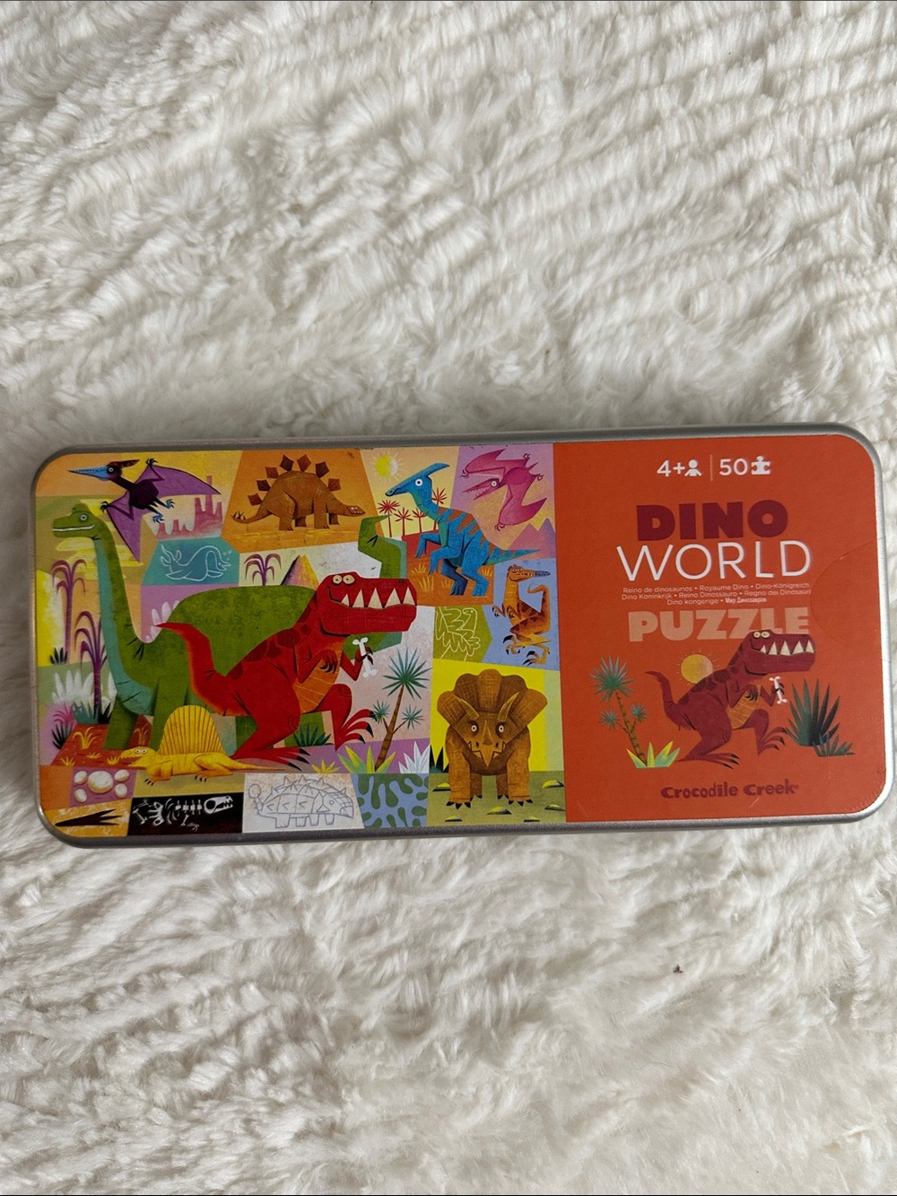 Crocodile Creek Dino World 50-piece puzzle, in a tin storage box - Picture 3 of 4